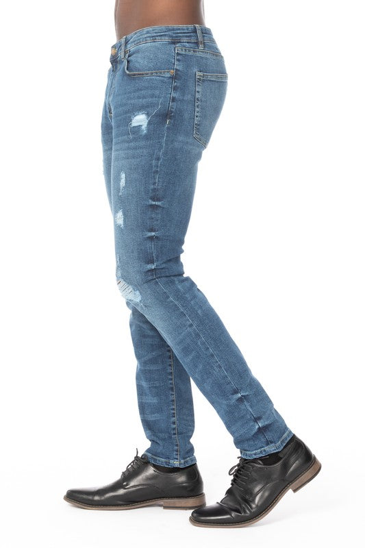 DISTRESSED RIP SLIM TAPER DENIM JEANS